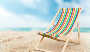 Stripy deckchair on the beach